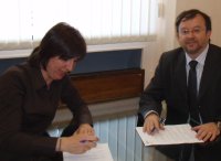 firma convenios ASES y UPTA